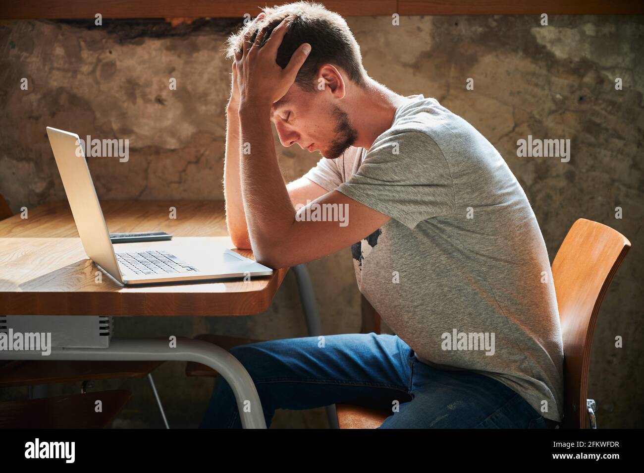 Pensive young man thinking work hi-res stock photography and images - Alamy