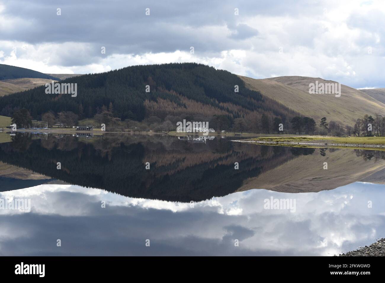 St Mary's Loch Selkirkshire. Scotland 14th April 21 Reflections on St Mary's Loch is the largest natural loch in the Scottish Borders, 3.1 miles long Stock Photo