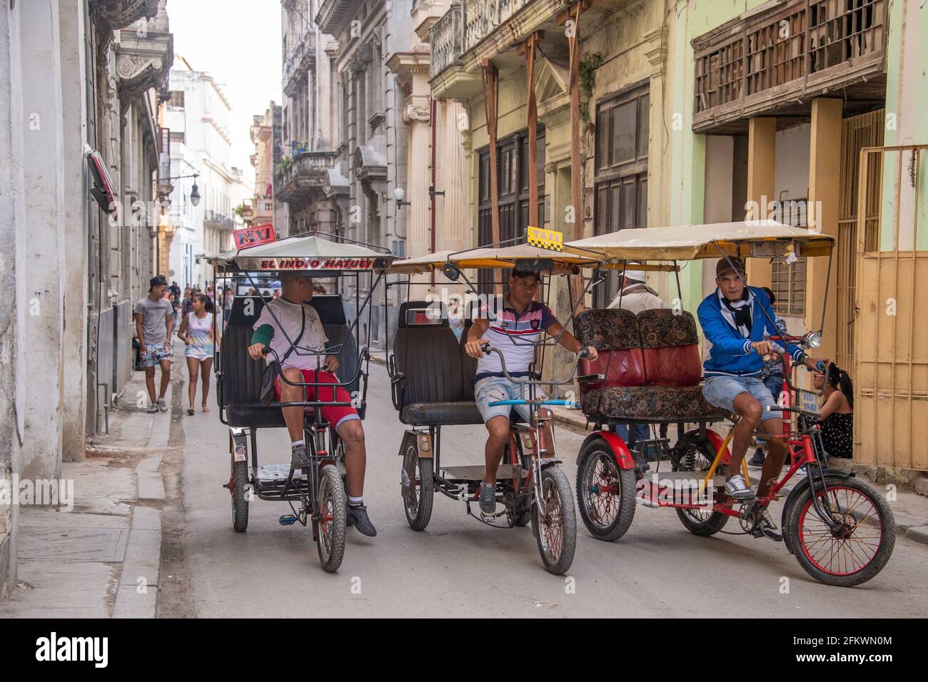 Three bici-taxis in Old Havana, Cuba Stock Photo