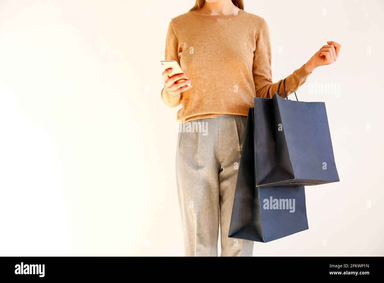 Young slim woman in classic fashionable 