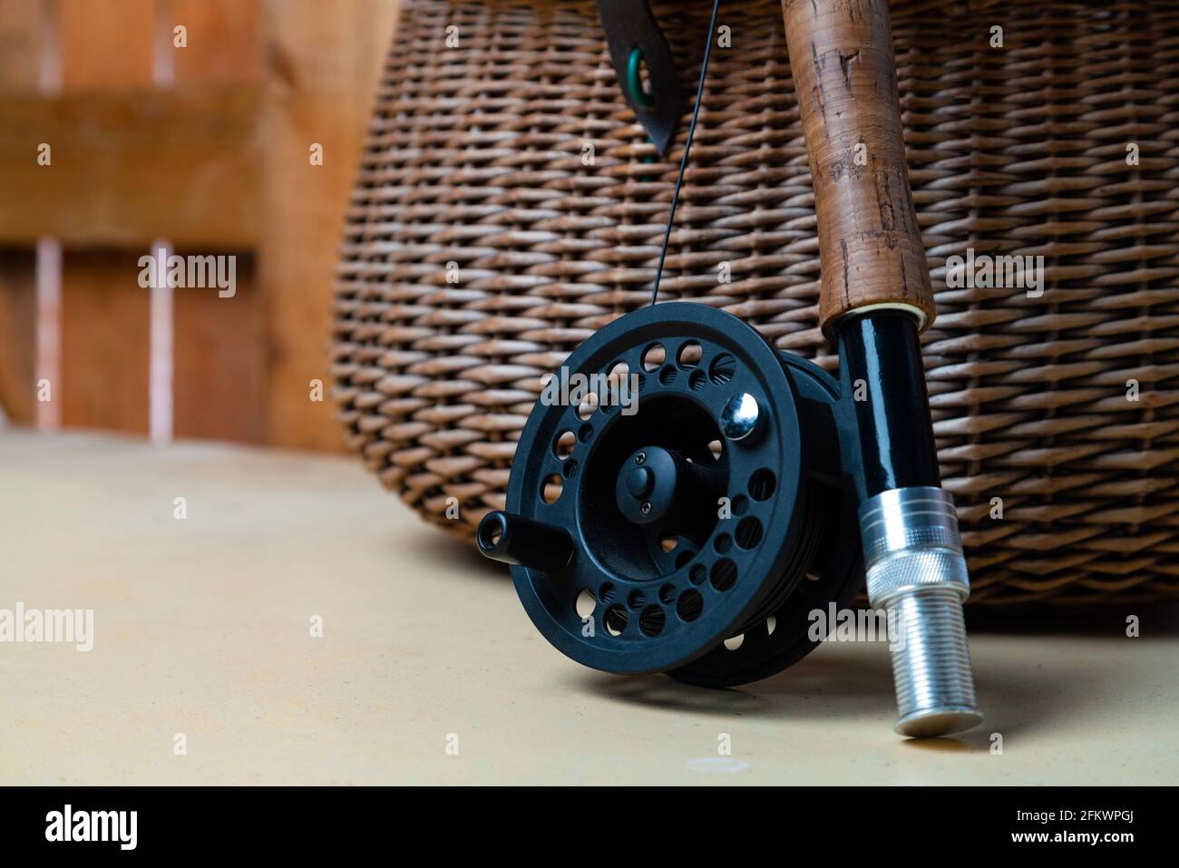 Traditional fly-fishing rod with equipment Stock Photo - Alamy