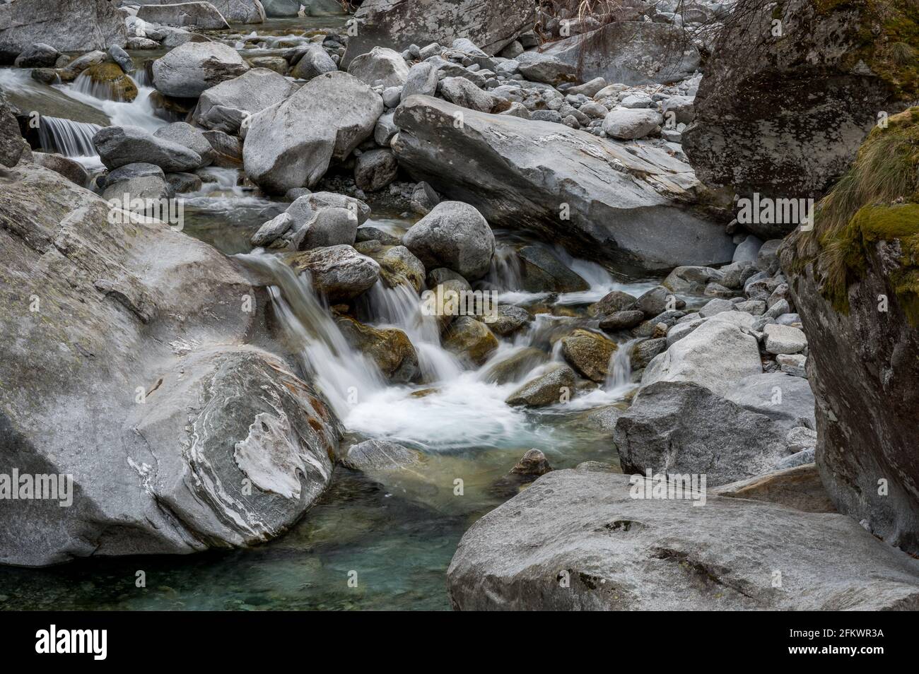 cristall clear water of mountain creek Calnègia in Valle Bavona, Ticino Stock Photo