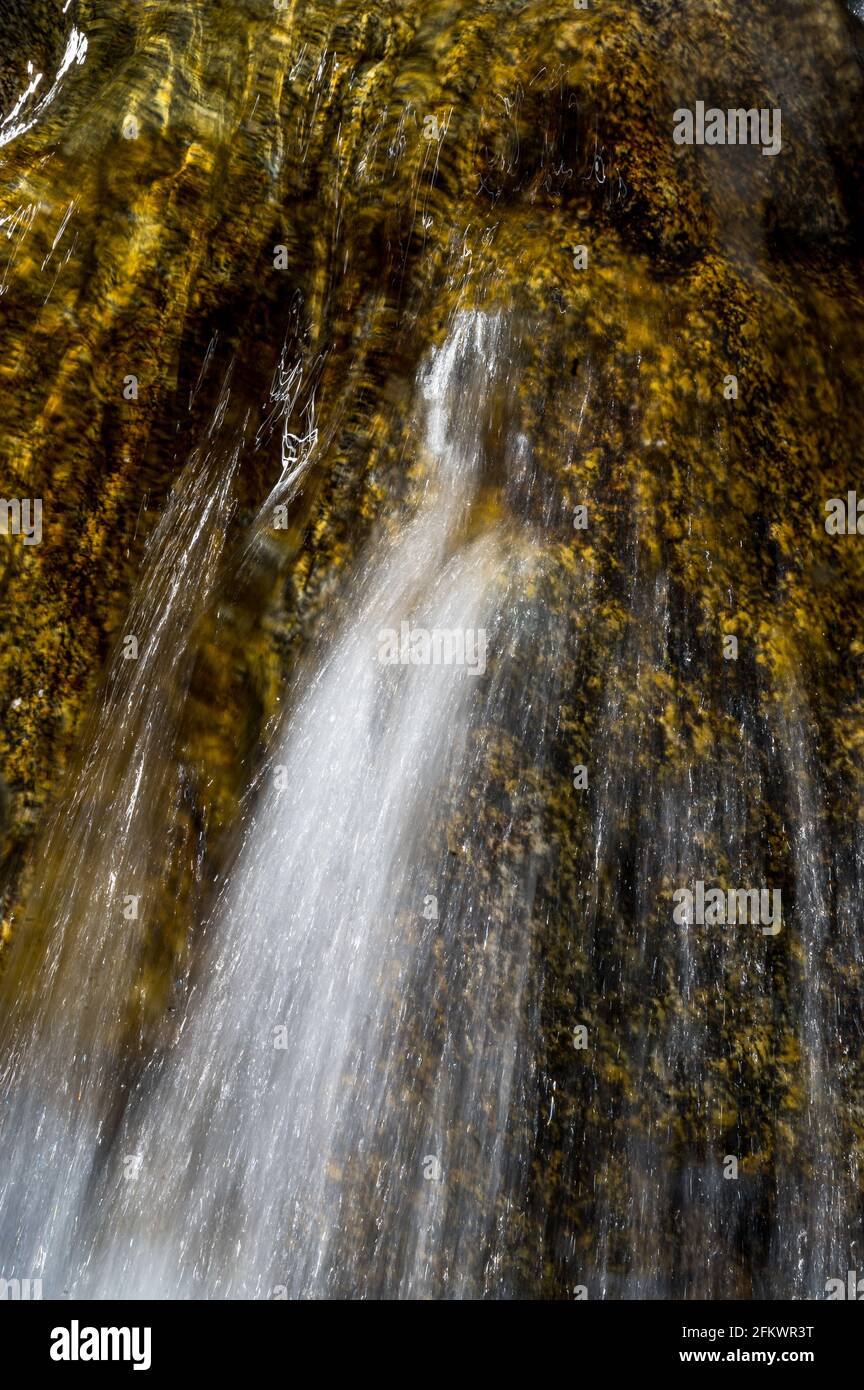 long exposure image of water flowing in mountain creek Calnègia in Valle Bavona Stock Photo