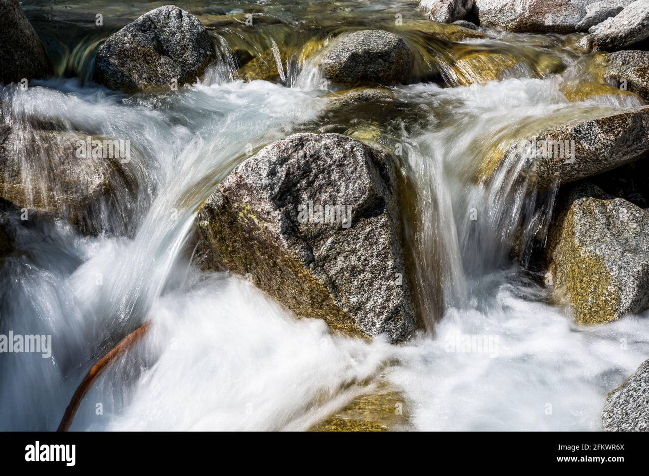 long exposure image of water flowing in mountain creek Calnègia in Valle Bavona Stock Photo