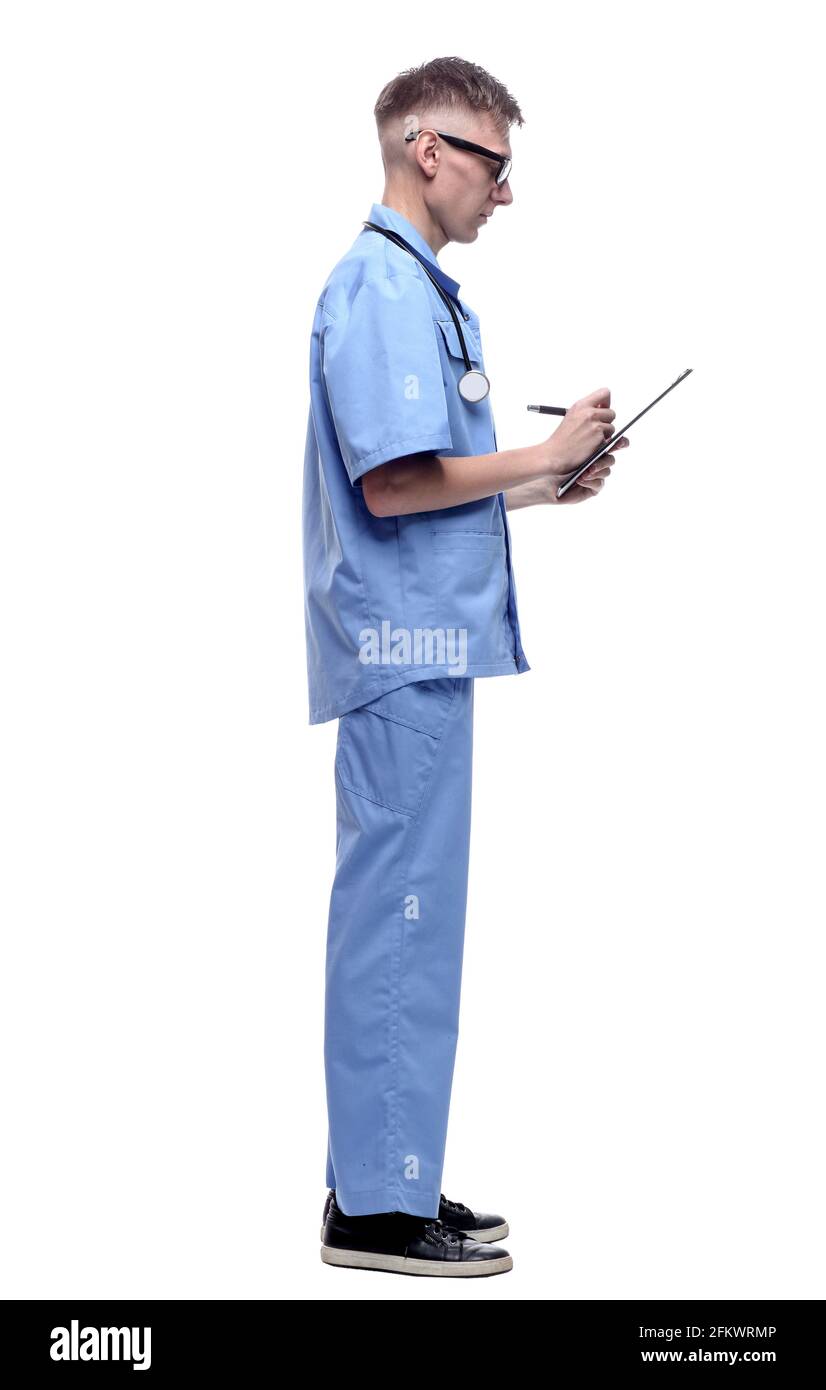 side view. serious doctor taking notes in the clipboard Stock Photo - Alamy
