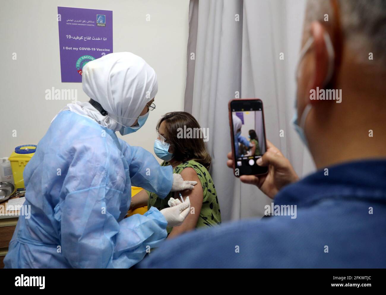 Beirut, Lebanon. 4th May, 2021. A woman receives COVID-19 vaccine in a hospital in Beirut, Lebanon, on May 4, 2021. Lebanon registered on Monday 249 new COVID-19 cases, raising the total number of infections to 528,457, the Health Ministry reported. Lebanese Caretaker Health Minister Hamad Hassan said he expects 60 percent of the Lebanese to be vaccinated by September 2021. Credit: Bilal Jawich/Xinhua/Alamy Live News Stock Photo