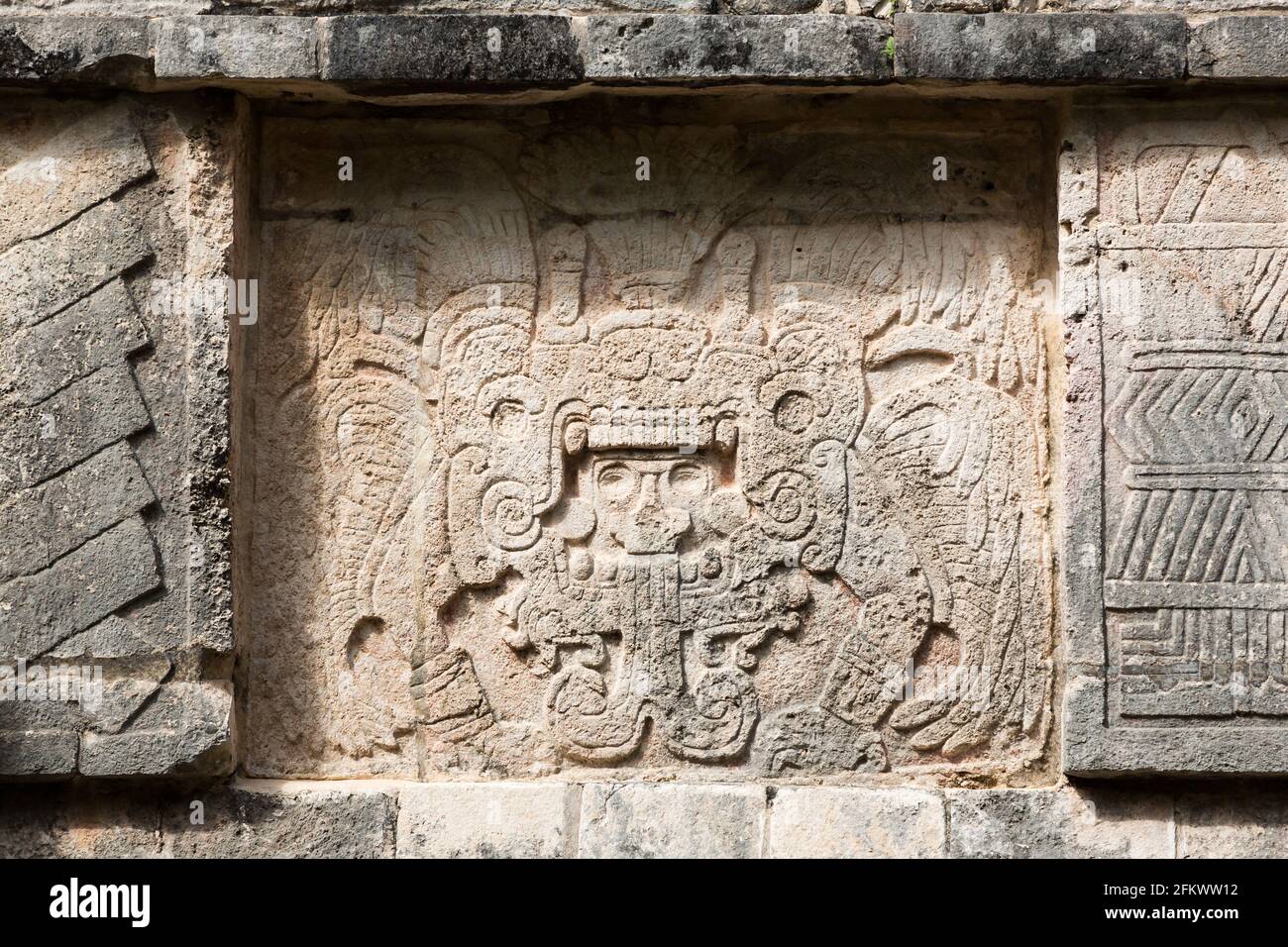 Relief carving at the platform of Venus, Chichen-Itza, Yucatan, Mexico Stock Photo