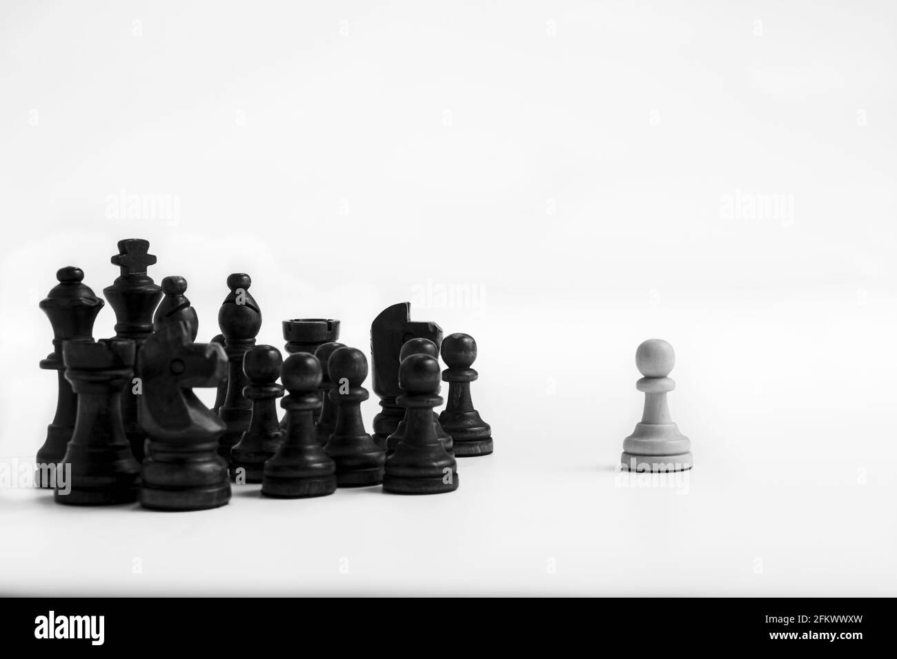 A completed chess game setup on a table with opposing chairs in a dark room  backlit by a bright window light - 3D render Stock Photo - Alamy