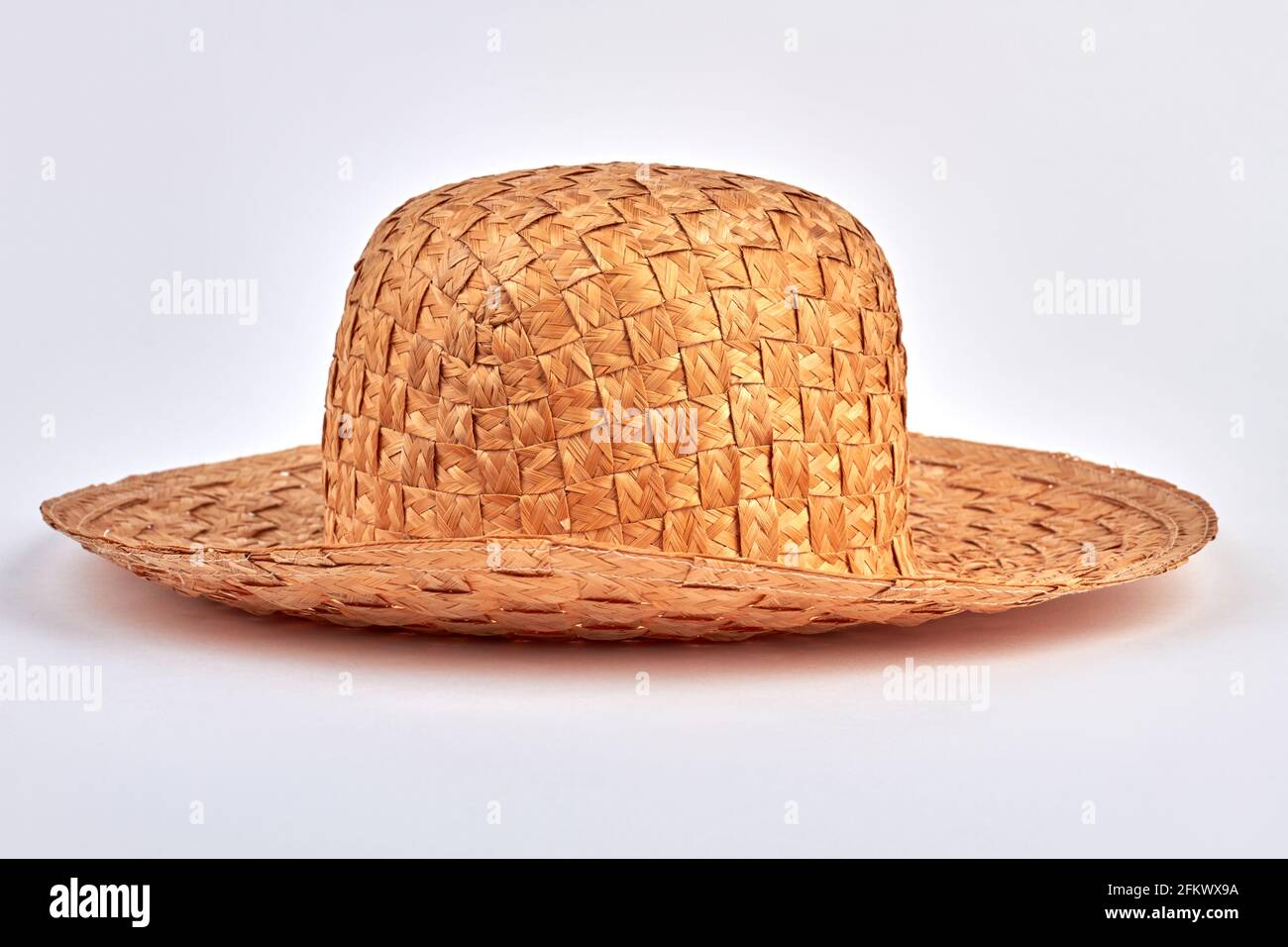 Summer straw hat isolated on white background Stock Photo - Alamy