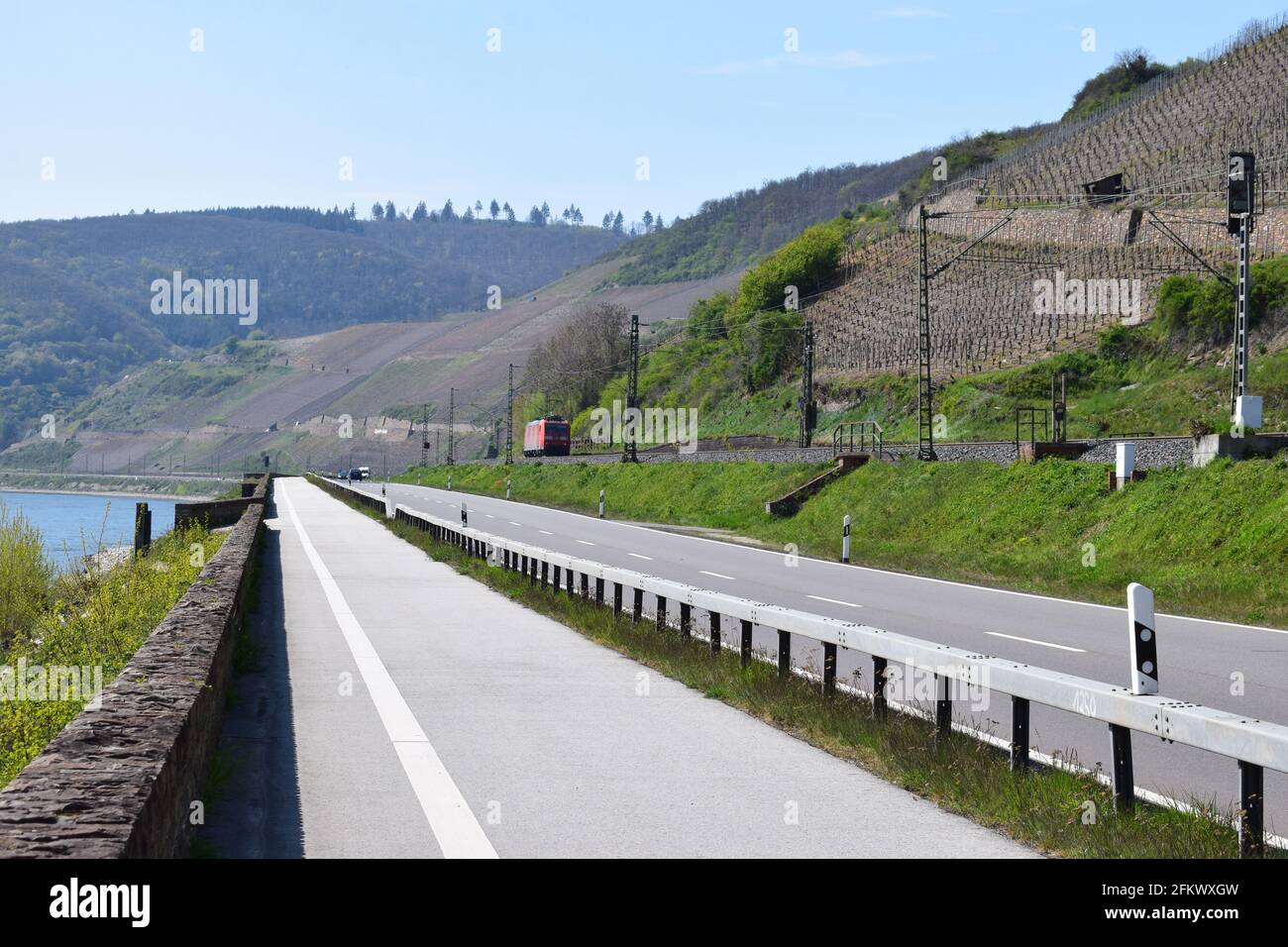 road through Mittelrheintal with railroad alongside Stock Photo