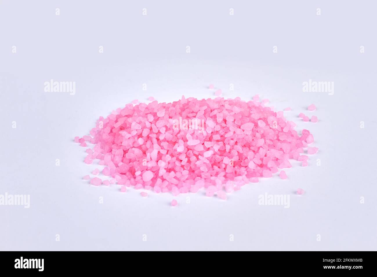Pile of pink bath salt isolated on white background Stock Photo Alamy