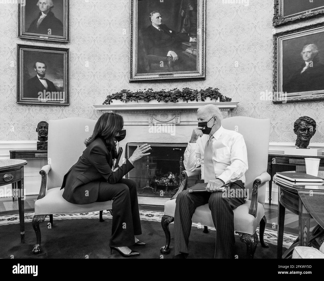 Washington, USA. 30th Mar, 2021. President Joe Biden talks with Vice President Kamala Harris Tuesday, March 30, 2021, in the Oval Office of the White House. (Official White House Photo by Adam Schultz via Credit: Sipa USA/Alamy Live News Stock Photo