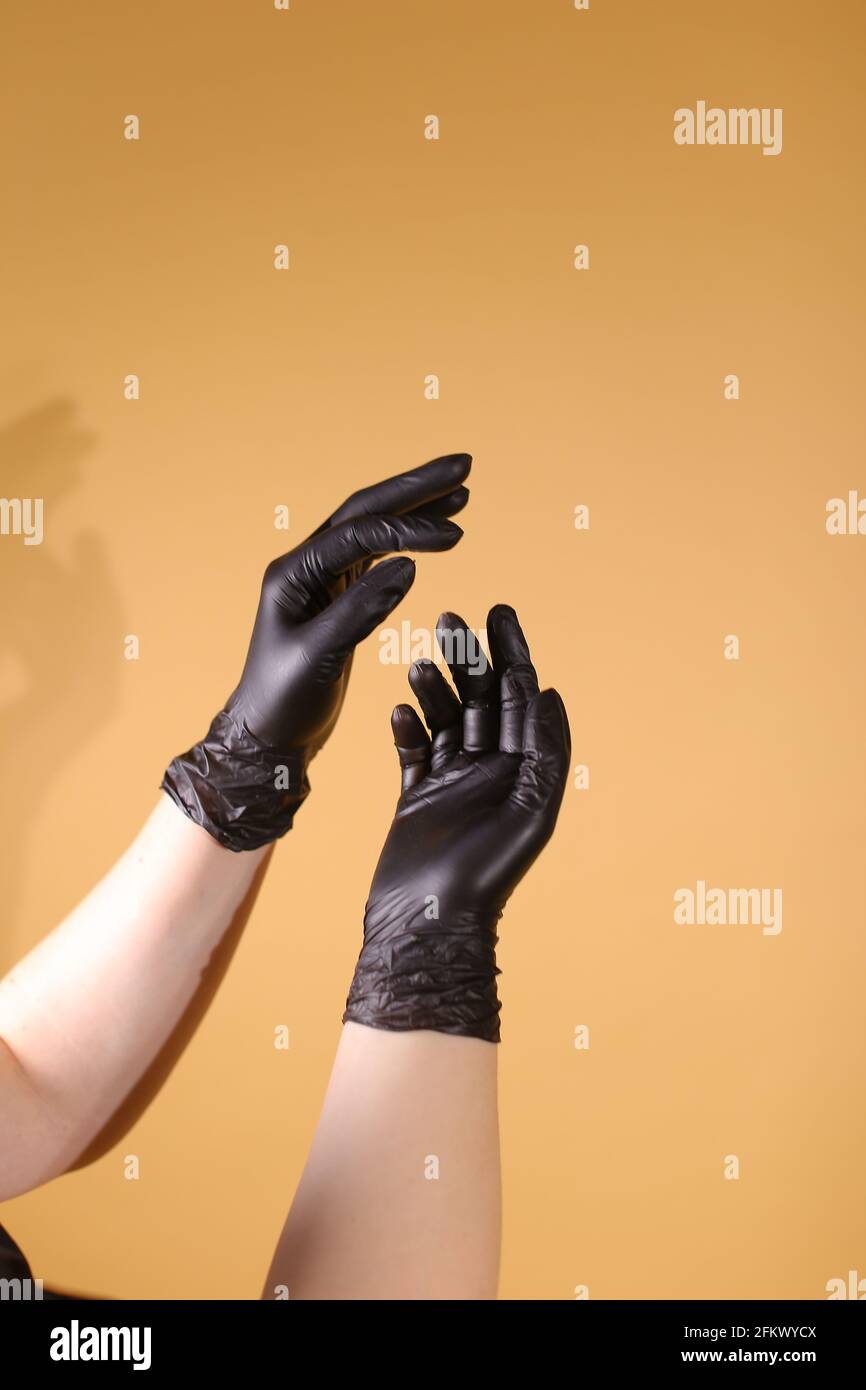Black Surgical Latex Glove for hair dying salon Stock Photo Alamy