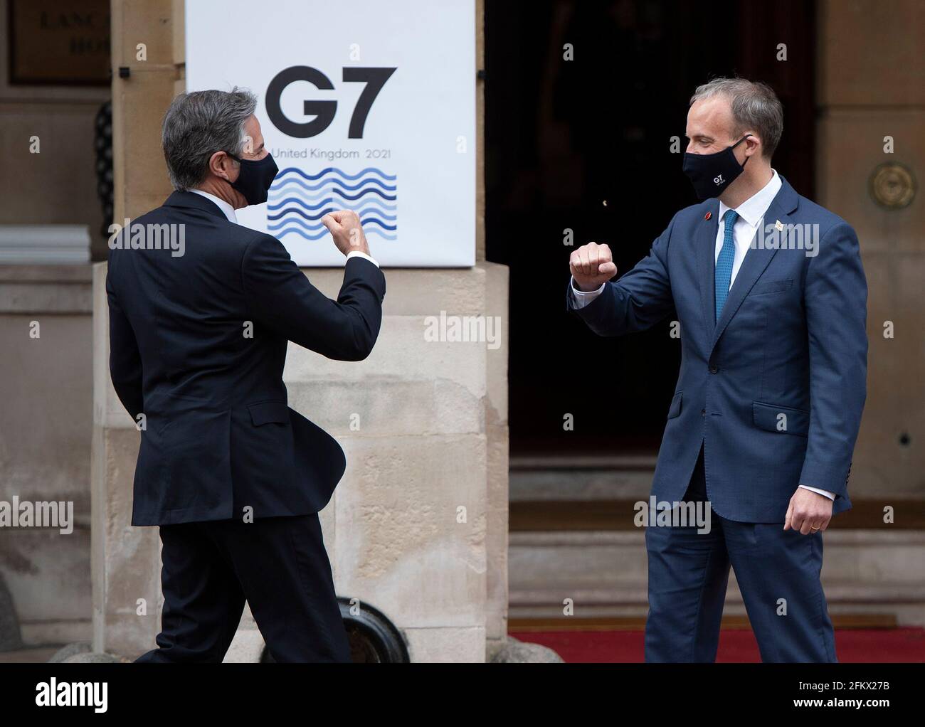 Foreign Secretary Dominic Raab (right) greets US Secretary of State Antony Blinken, as he arrives at Lancaster House in London for talks with fellow foreign ministers from the G7 Foreign and Development Ministers meeting. Picture date: Tuesday May 4, 2021. Stock Photo
