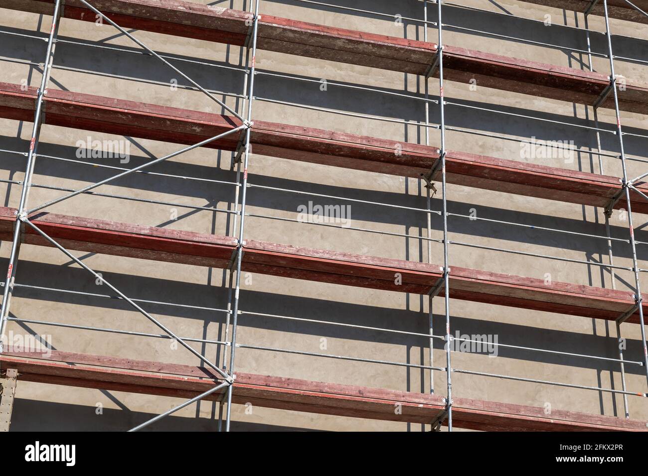 Scaffolding background at the construction site, temporary structure