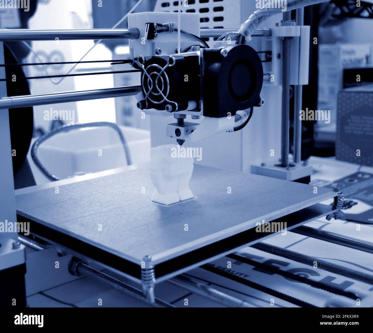The process of working 3D printer and creating a three-dimensional object Stock Photo