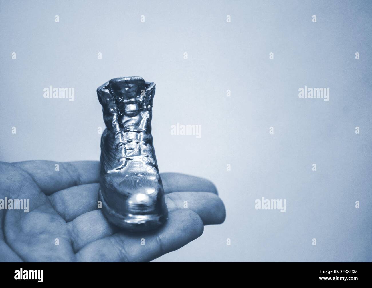 Object in the form of a boot printed on a 3d printer and covered with enamel Stock Photo