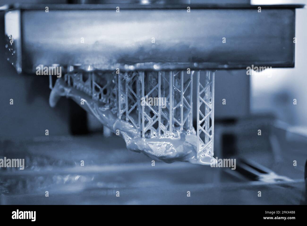 Stereolithography DPL 3d printer create small detail and liquid drips Stock Photo