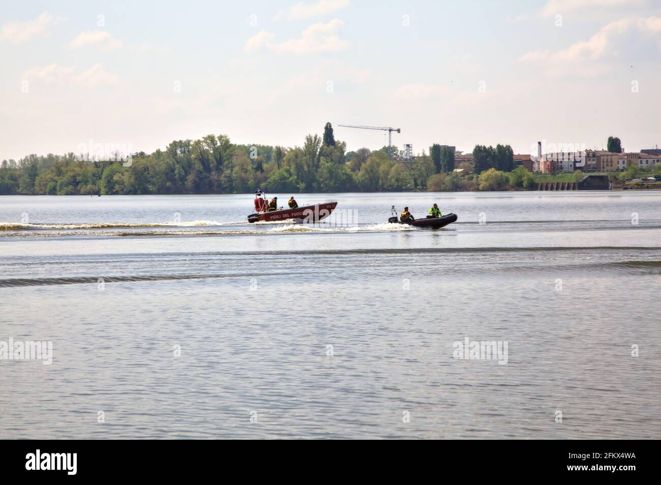 Italian firefighters on boats on a lake during a trianing Stock Photo