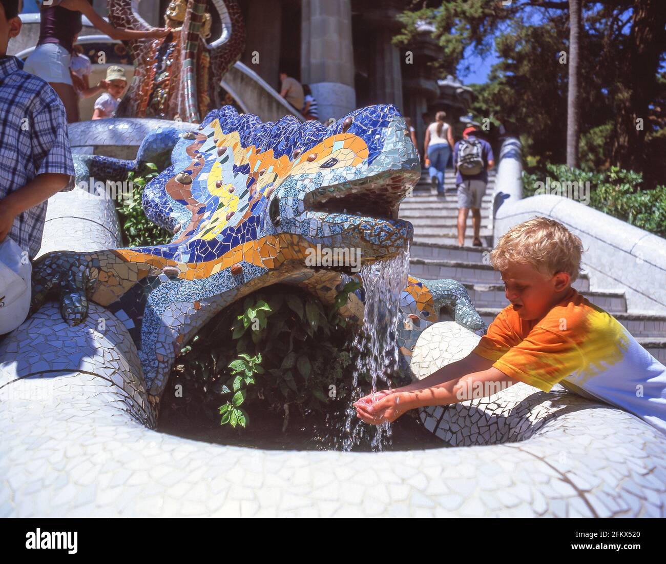 Gaudi's mosaic dragon fountain, Park (Parc) Guell, Gràcia District, Barcelona, Province of Barcelona, Catalonia, Spain Stock Photo
