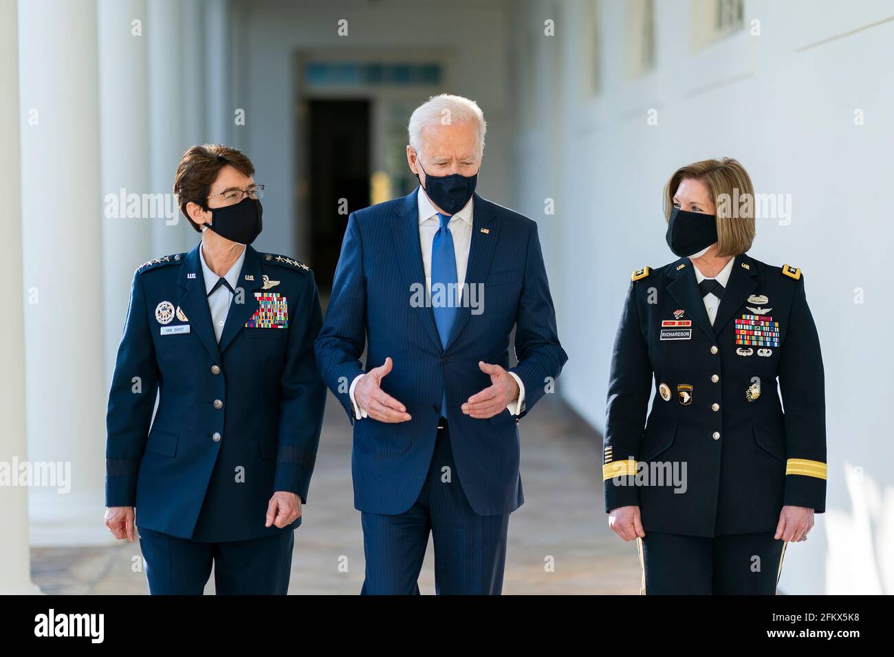 President Joe Biden walks along the Colonnade with the Combatant Commander nominees U.S. Air Force Gen. Jacqueline Van Ovost and U.S. Army Lt. Gen. Laura Richardson on Monday, March 8, 2021, along the Colonnade of the White House. (Official White House Photo by Adam Schultz) Stock Photo
