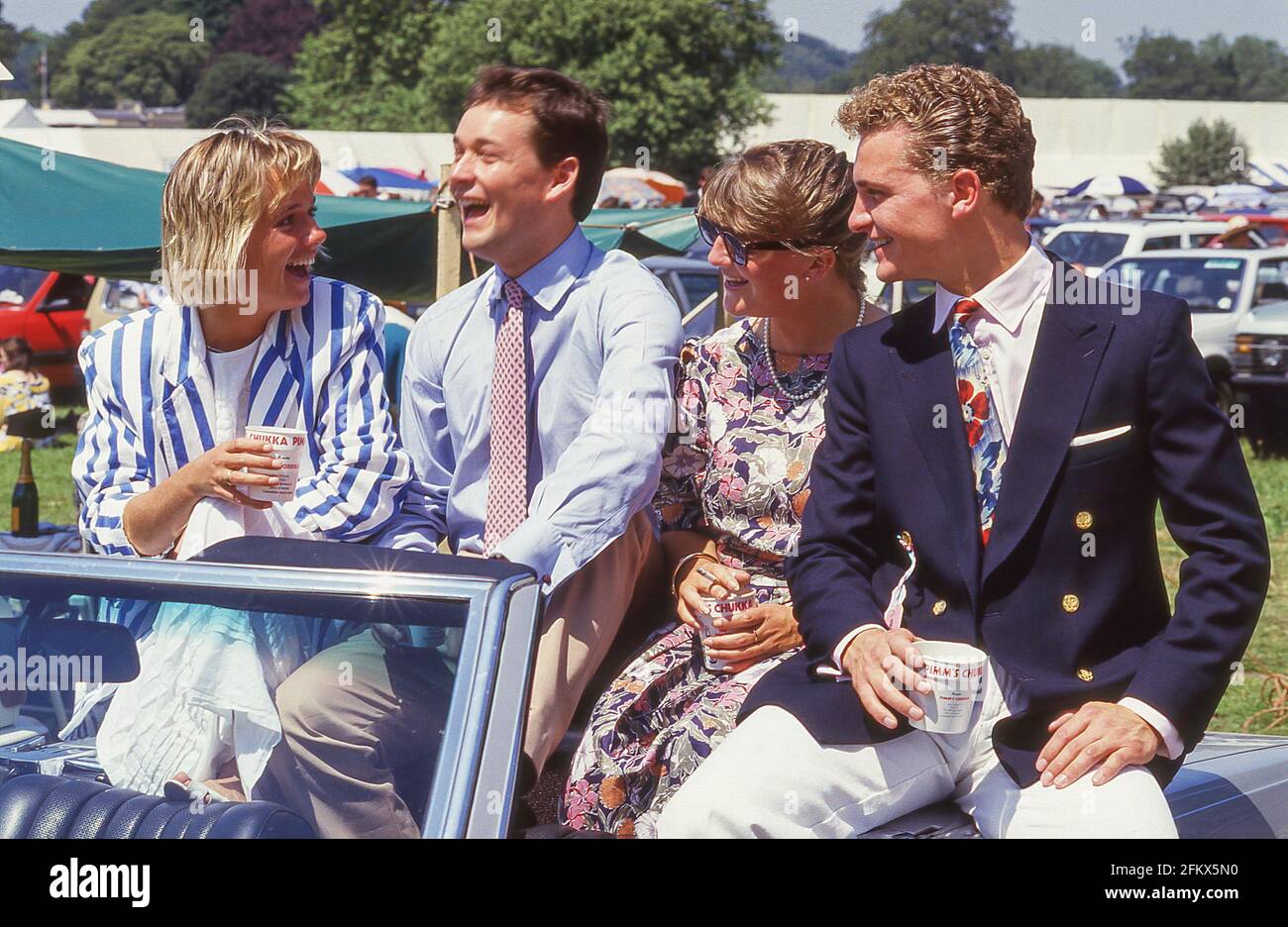 Group of young guests at Henley Regatta, Henley-on-Thames, Oxfordshire, England, United Kingdom Stock Photo
