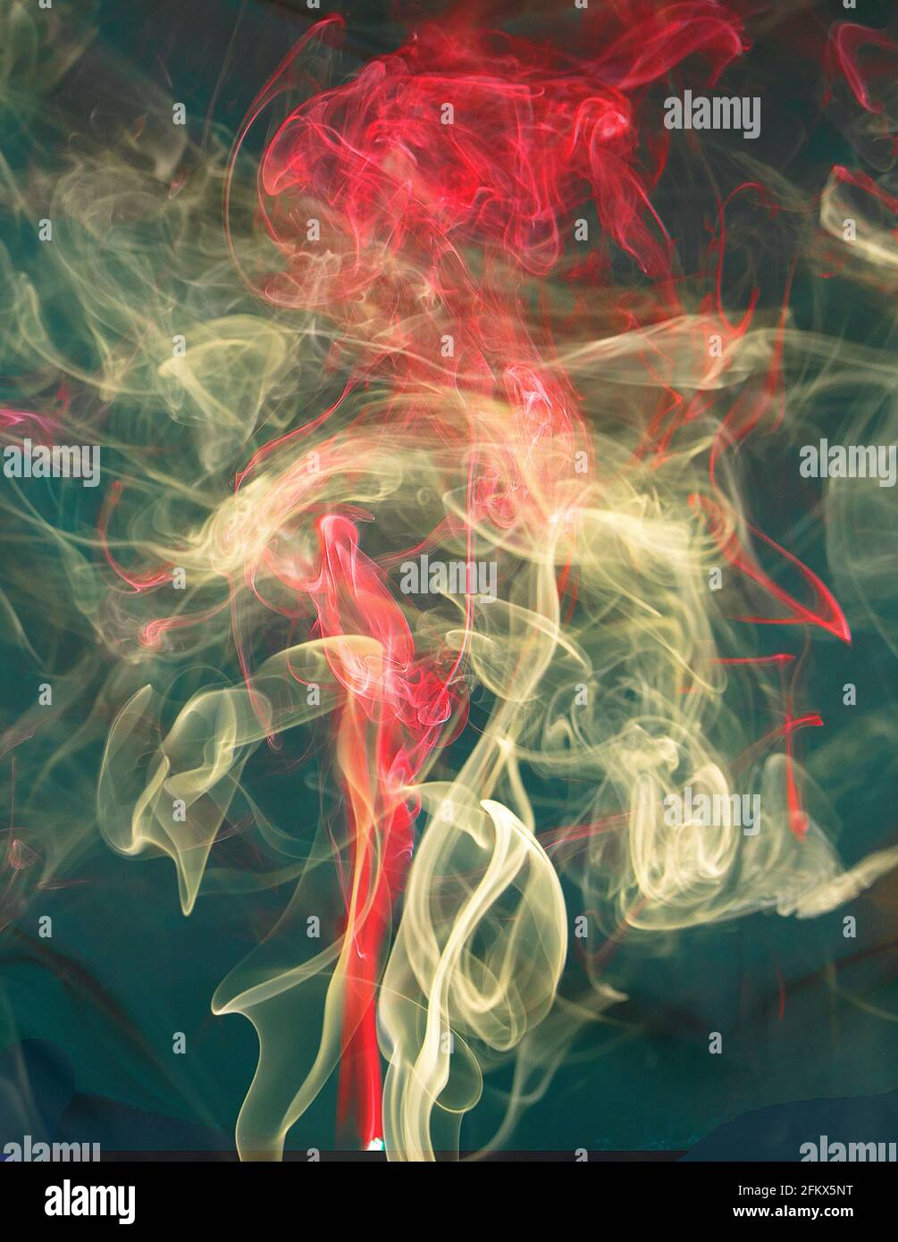 Abstract colorful smoke against a black background Stock Photo - Alamy