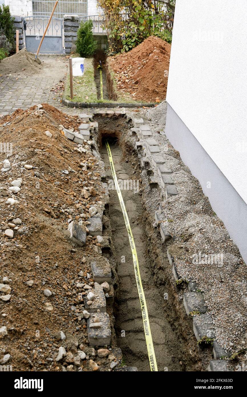 Excavation With Warning Tape, Warning Telekom Austria As Protection For Telecommunication Cables Stock Photo