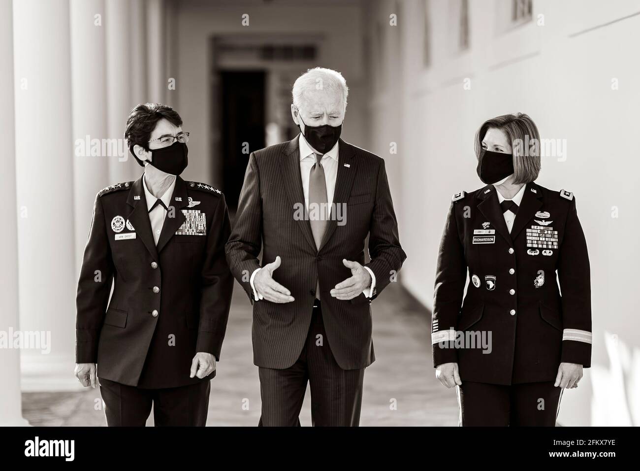 President Joe Biden walks along the Colonnade with the Combatant Commander nominees U.S. Air Force Gen. Jacqueline Van Ovost and U.S. Army Lt. Gen. Laura Richardson on Monday, March 8, 2021, along the Colonnade of the White House. (Official White House Photo by Adam Schultz) Stock Photo