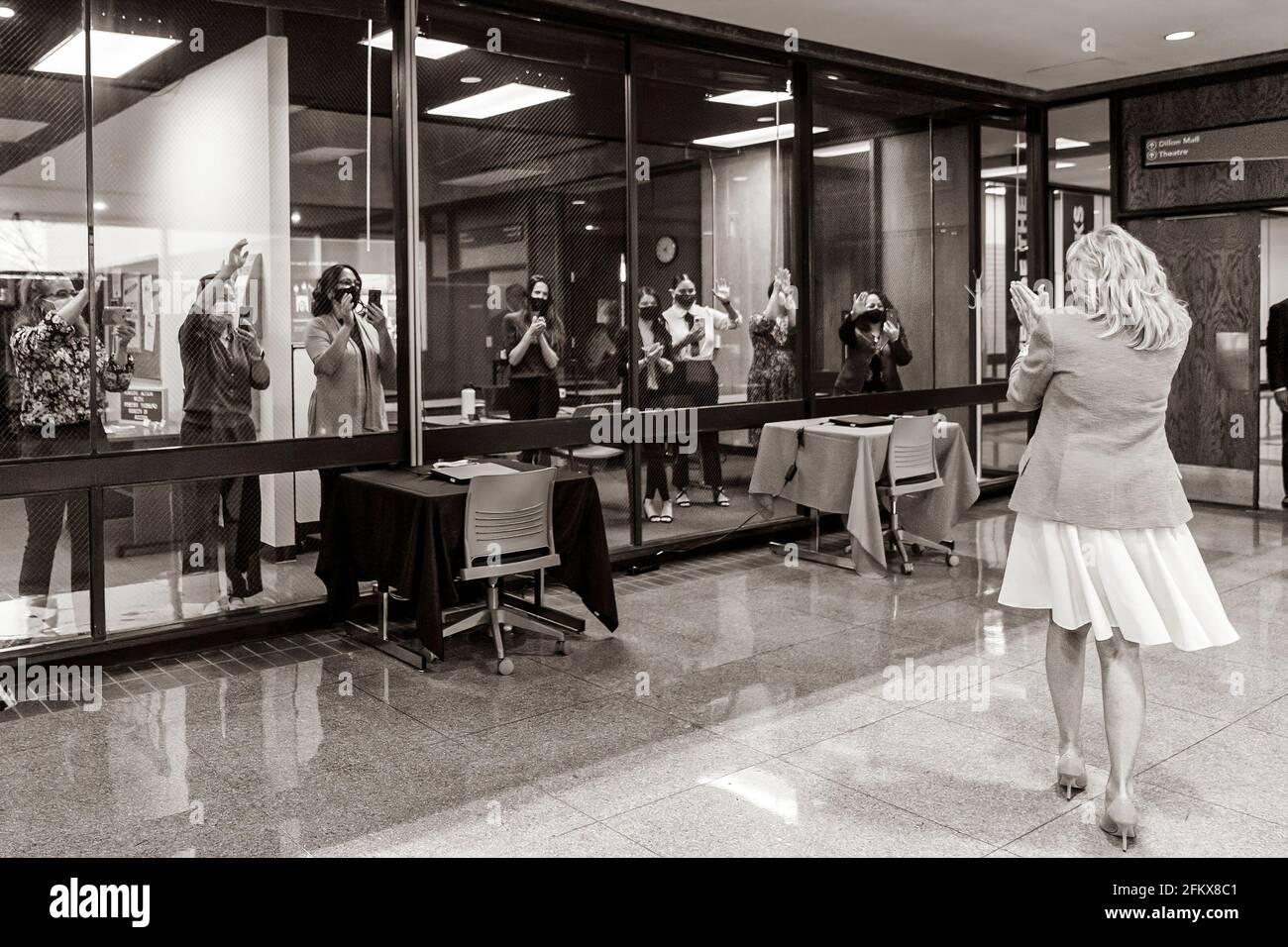 First Lady Jill Biden waves to onlookers as she arrives at Sauk Valley Community College in Dixon, Illinois on April 19, 2021. (Official White House Photo by Cameron Smith) Stock Photo