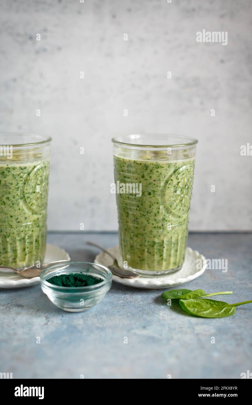 Smoothie with green apple kiwi fruit and spirulina Stock Photo Alamy