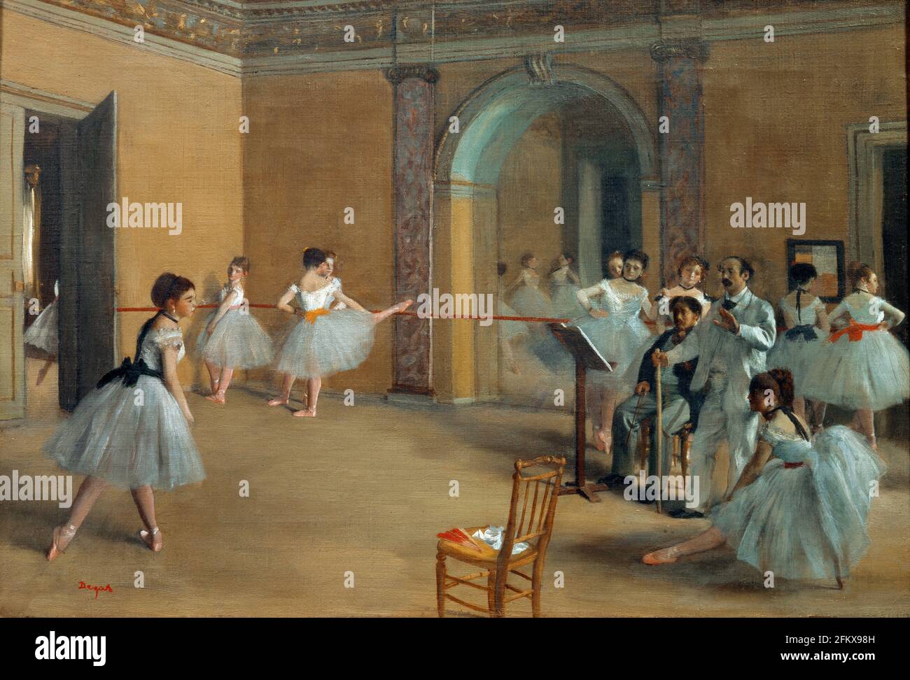 Title: The Dance Foyer at the Opera on the rue Le Peletier Creator:  Edgar Degas Date: 1872 Medium: Oil on canvas Dimensions: 32x46 cms Location: Musee d'Orsay, Paris, France Stock Photo