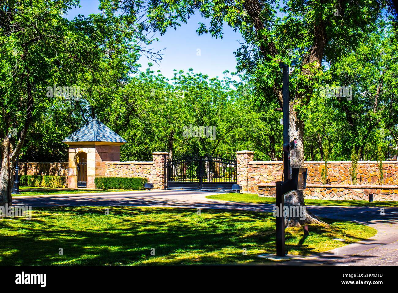 Metal Security Gate With Walk Thru Gate House Stock Photo Alamy