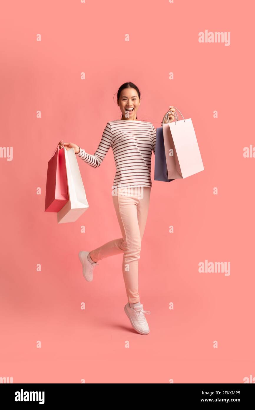 Shopping asian woman bags hi-res stock photography and images - Alamy
