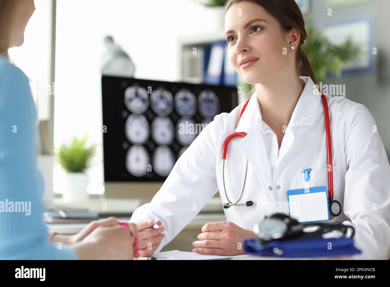 Doctor attending patient hires stock photography and images Alamy