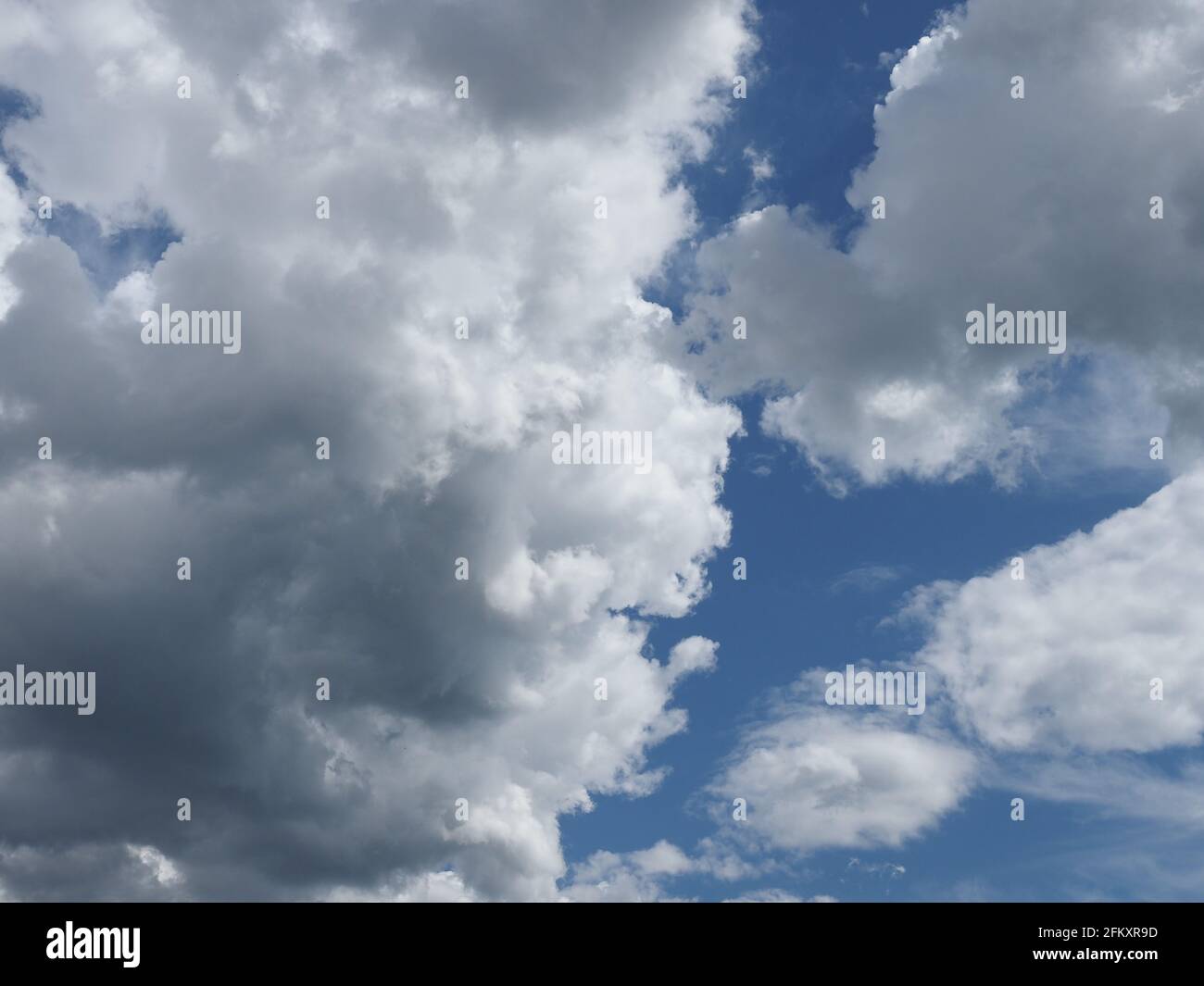 dramatic stormy blue sky with clouds useful as a background Stock Photo ...