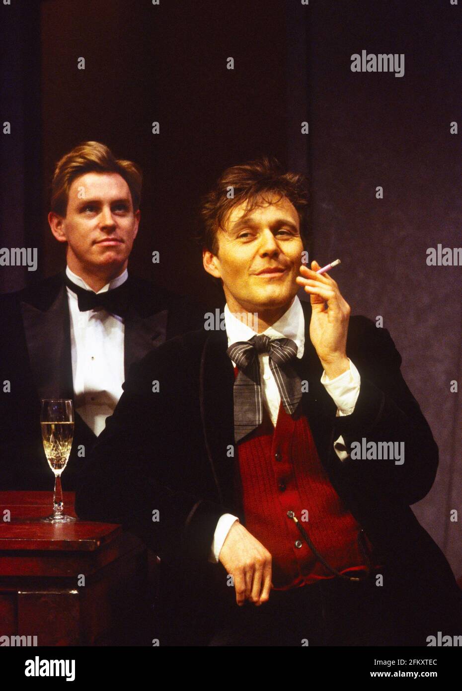 l-r: James Buller (Charles Granillo), Anthony Head (Rupert Cadell) in ROPE by Patrick Hamilton at Wyndham's Theatre, London WC2  11/04/1994  design: Simon Higlett  lighting: Bill Bray  director: Keith Baxter Stock Photo