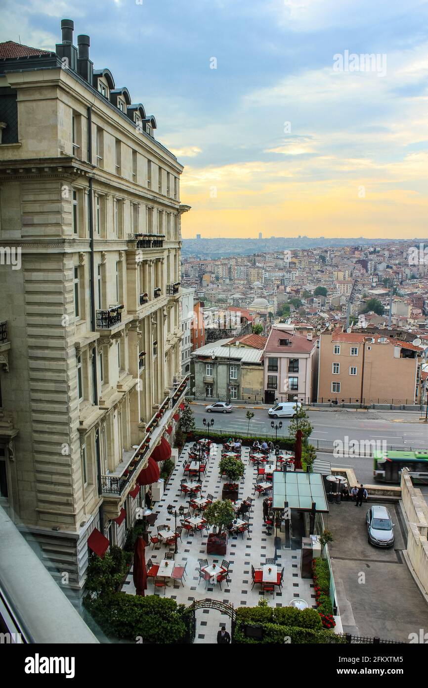 Istanbul, Turkey - May 13, 2013: View of Istanbul and Pera Palace Hotel Restaurant from Marmara Pera Hotel Room Stock Photo