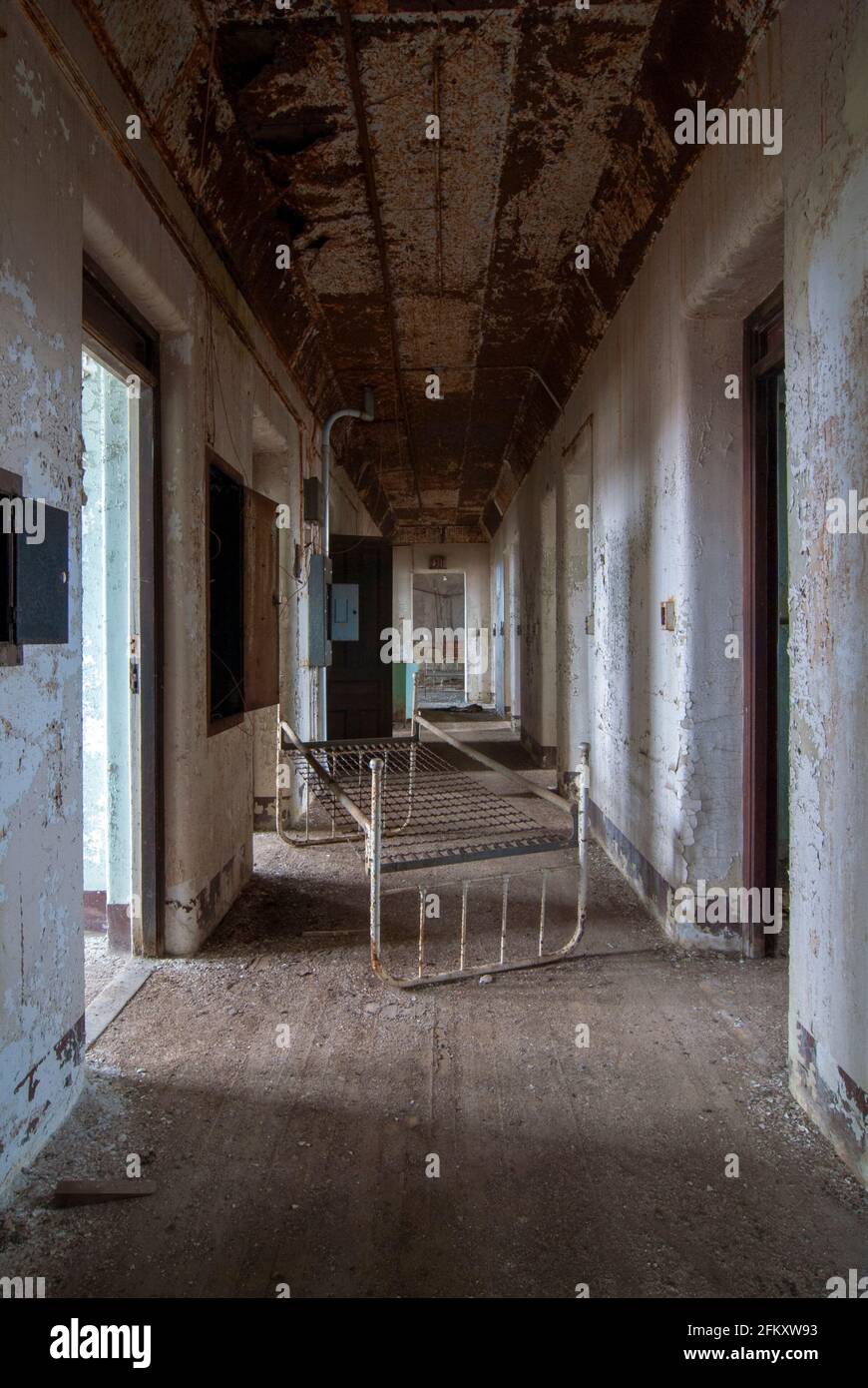 Interior of an abandoned decaying mental hospital Stock Photo - Alamy