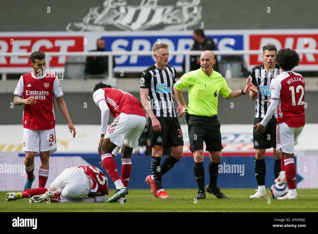 Fabian Schar of Newcastle United receives a red card from Referee, Mike