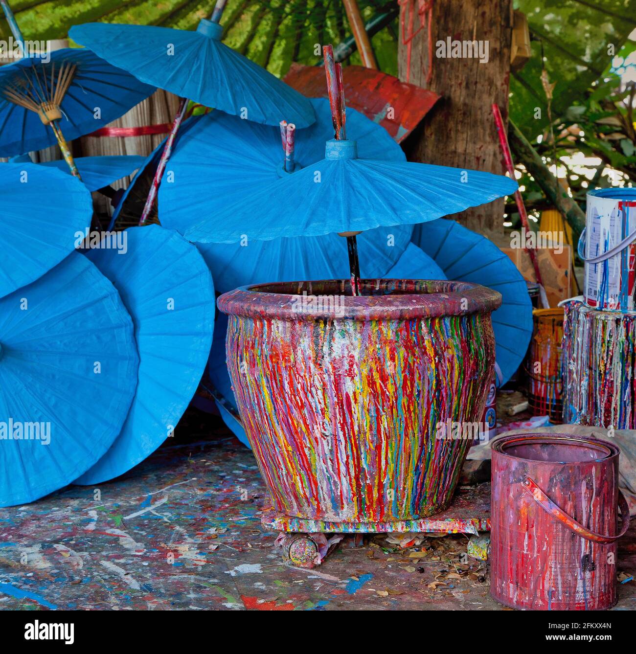 Thai Umbrellas drying after painting around a Pot of the rainbow, in