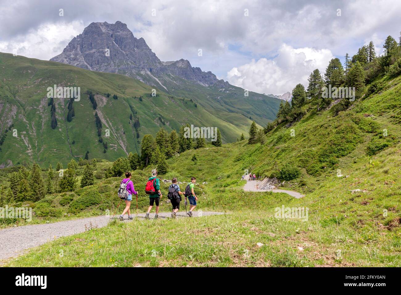 Hikers In The Hiking Area Schröcken, Vorarlberg, Austria Stock Photo