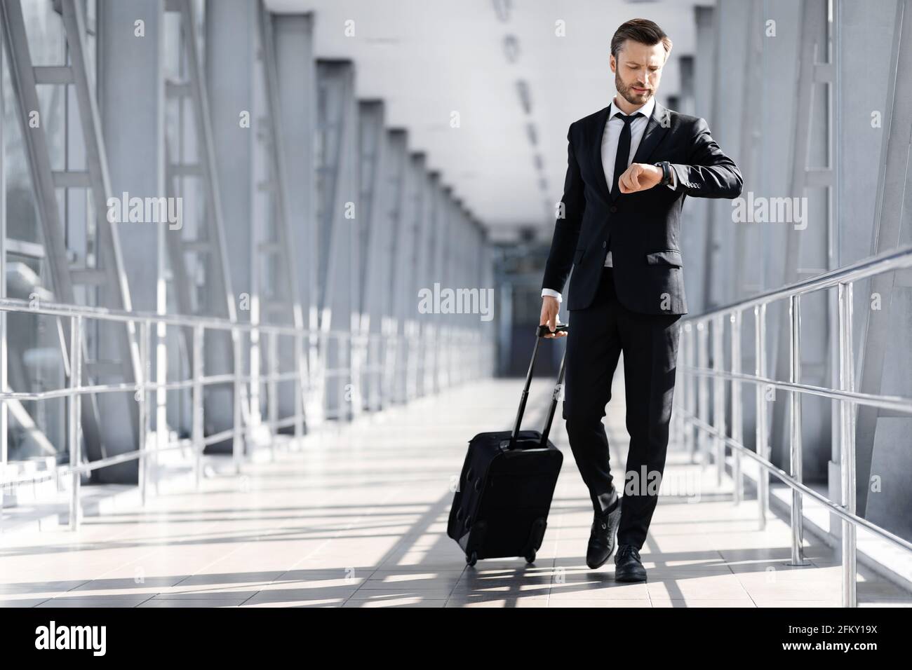 Waiting middle aged man checking hi-res stock photography and images ...