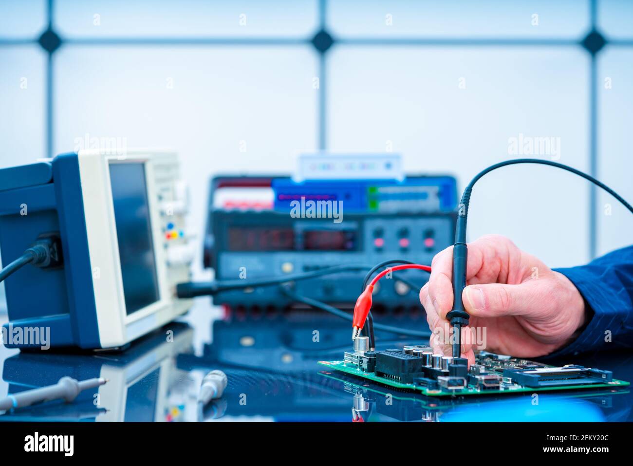 PCB witch microcontroller in electronics laboratory Stock Photo