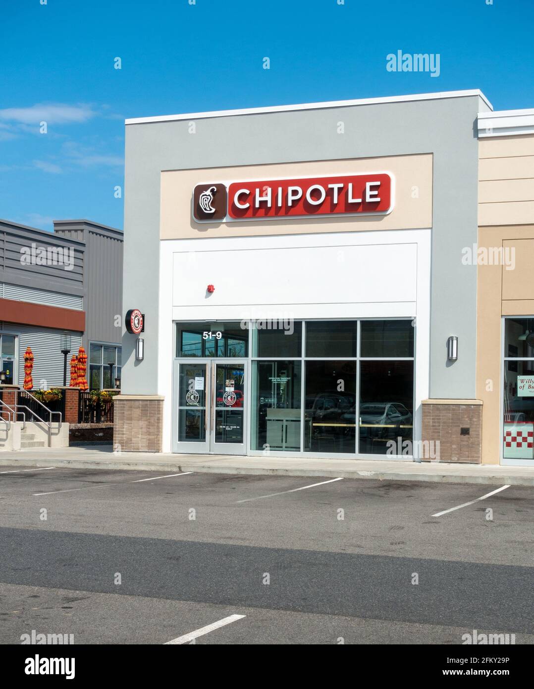 Chipotle Restaurant Storefront in Shopping Area, Plymouth, Massachusetts USA Stock Photo