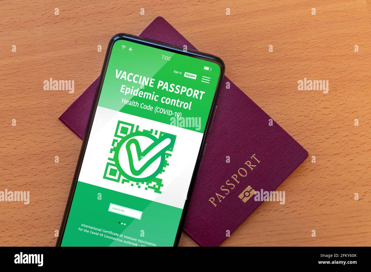 Smartphone application with digital vaccination passport to travel safely during the cavid-19 epidemic. Stock Photo