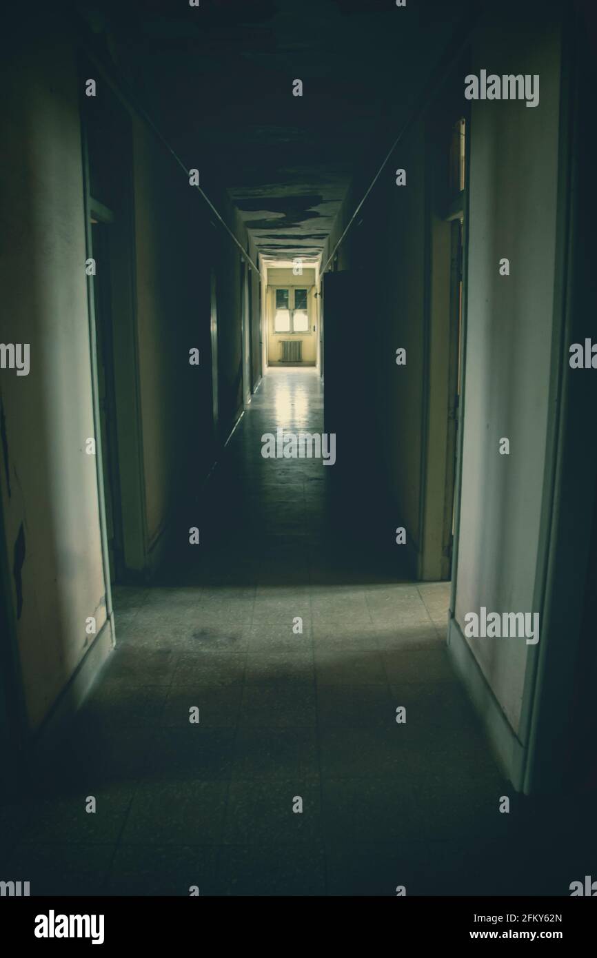 mystery corridor of an abandoned hotel Stock Photo