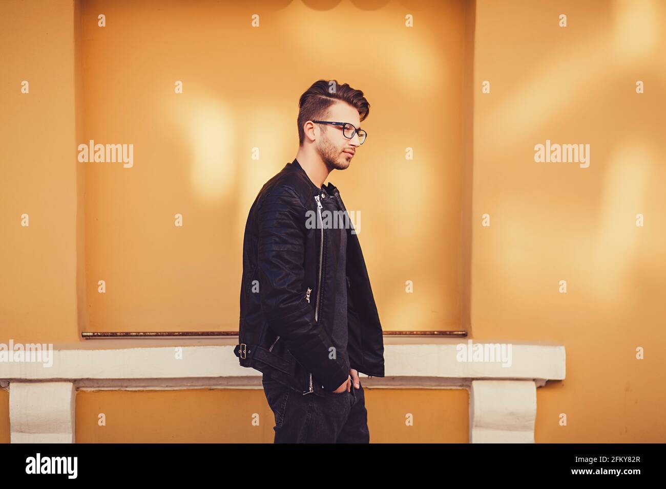 Handsome man in leather jacket hi-res stock photography and images - Alamy