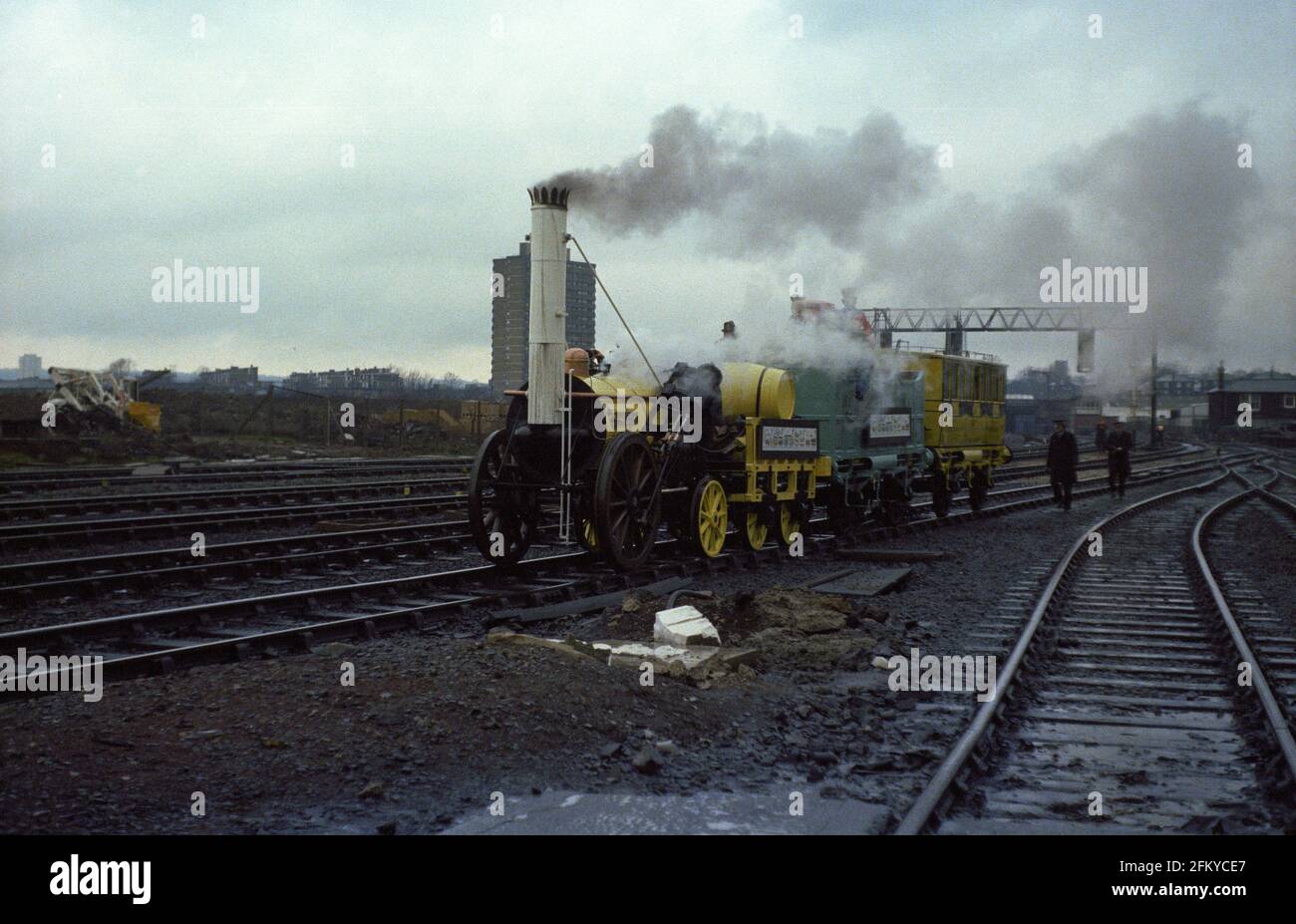 Police follow a replica of Stephenson's Rocket at St. Pancras Station, London, 10th March 1980, marking the issue of a set of stamps by Royal Mail. Stock Photo