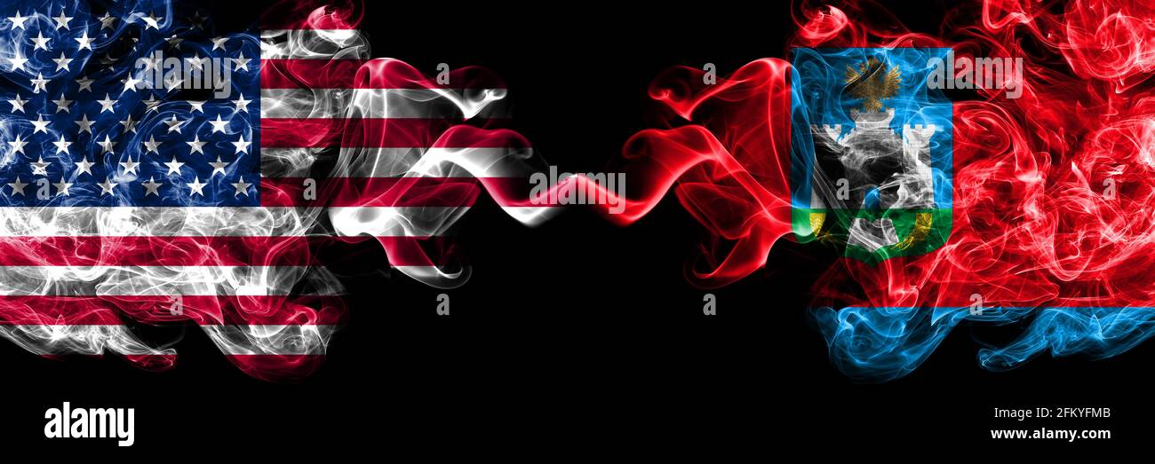 United States of America, America, US, USA, American vs Russia, Russian, Oryol Oblast smoky mystic flags placed side by side. Thick colored silky abst Stock Photo